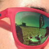 Temple flag reflected in glasses