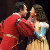 Two actors portraying Romeo and Juliet